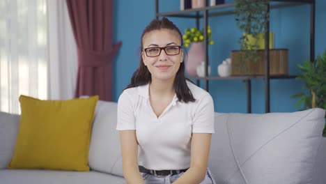 The-young-woman-wearing-glasses.